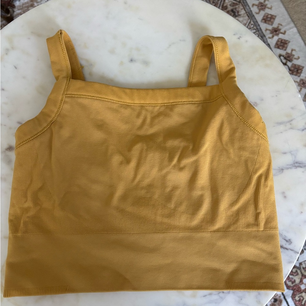 Yellow tank top with built in coverage. Size medium white cargos. YPB.